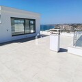 New 4 bedroom villa with sea view on Areia Branca beach.